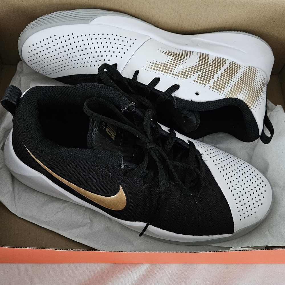 Nike Black and White Sneakers with Gold Swoosh